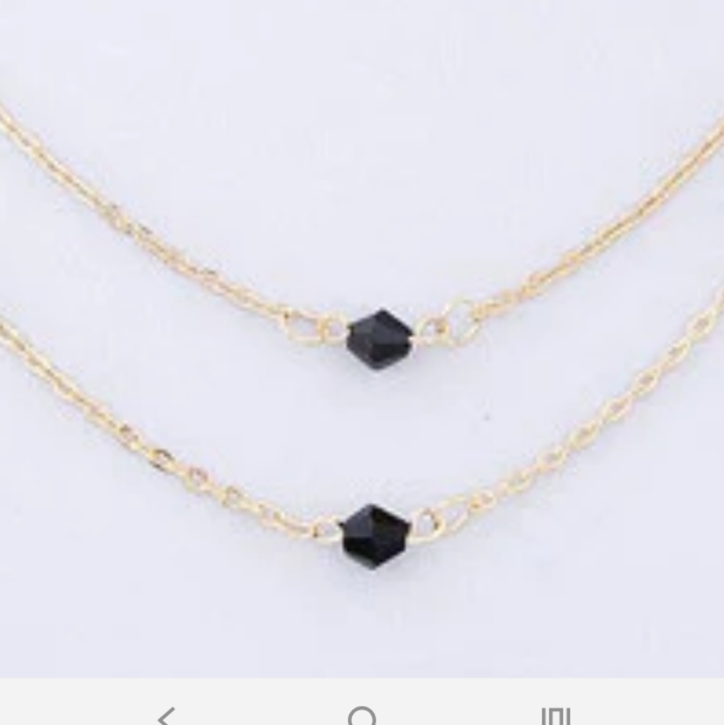Necklace With A Black Stone